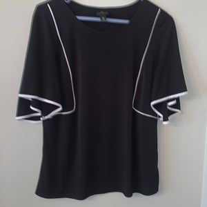 Elegant Black Top with White Trim